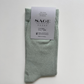 Women's premium cotton crew socks in sage green with vintage argyle pattern, seamless toe, and left-right foot design detail – breathable and stretchable for all-season wear
