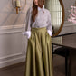 Elegant cotton maxi skirt with subtle satin sheen and hidden side pockets– high quality and perfect for special occasions. 