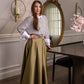 Elegant cotton maxi skirt with subtle satin sheen and hidden side pockets– high quality and perfect for special occasions. 