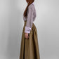 Elegant cotton maxi skirt with subtle satin sheen and hidden side pockets– perfect for special occasions. 