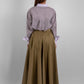 Elegant cotton maxi skirt with subtle satin sheen and hidden side pockets– perfect for special occasions. 