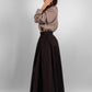 Elegant cotton maxi black skirt with subtle satin sheen and hidden side pockets