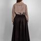 Elegant cotton maxi black skirt with subtle satin sheen and hidden side pockets
