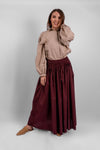 Women's pleated cotton maxi skirt in lightweight breathable fabric, modest summer fashion in burgundy