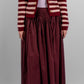 Women's pleated cotton maxi skirt in lightweight breathable fabric, modest summer fashion in burgundy